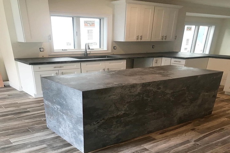 grey color kitchen island and white cabinets